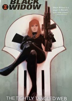 comic art of woman in chair with large black gun