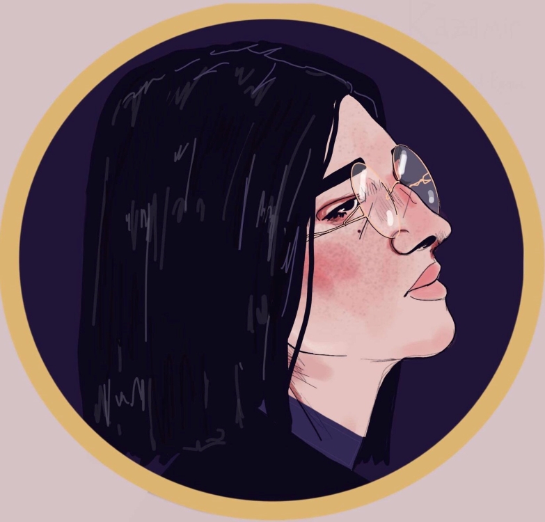 Vasira's character icon. She has pale skin, dark eyes, and straight black hair. She wears wire-rim glasses. She is shown in right-facing profile looking.