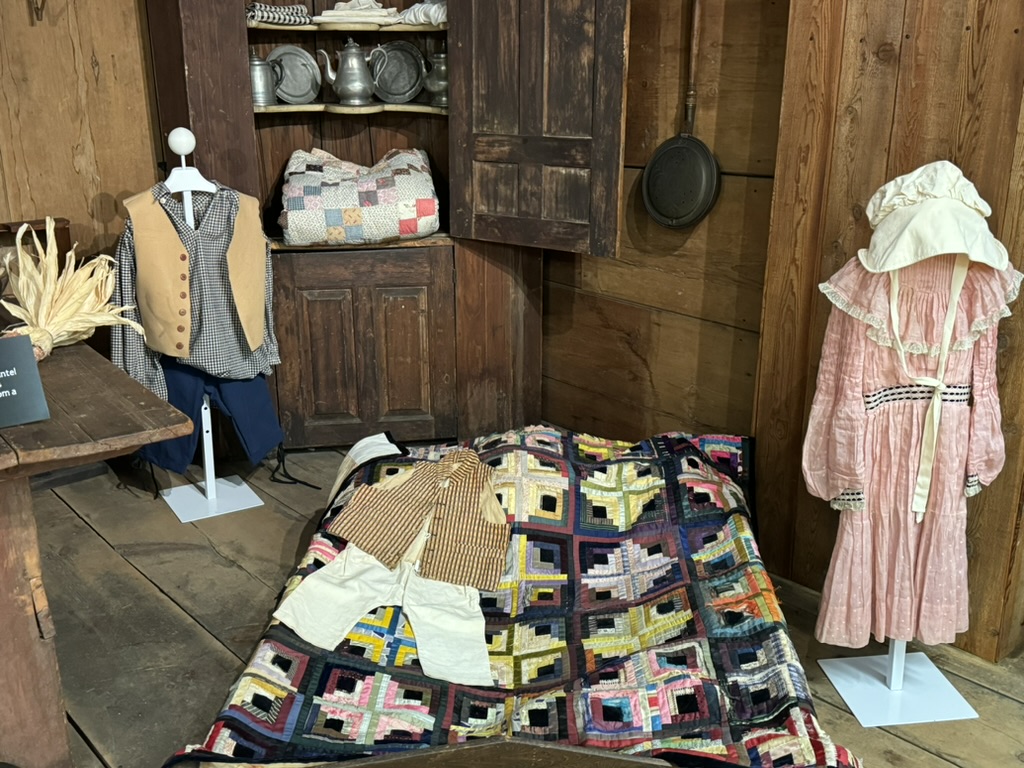 photo of a colonial bed and clothes